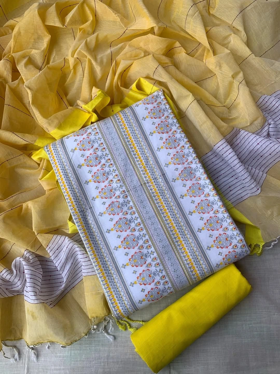 Unstitched Slub cotton three-piece.